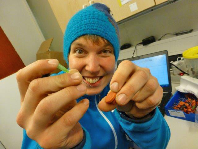 Emma doing needle job in the lab.