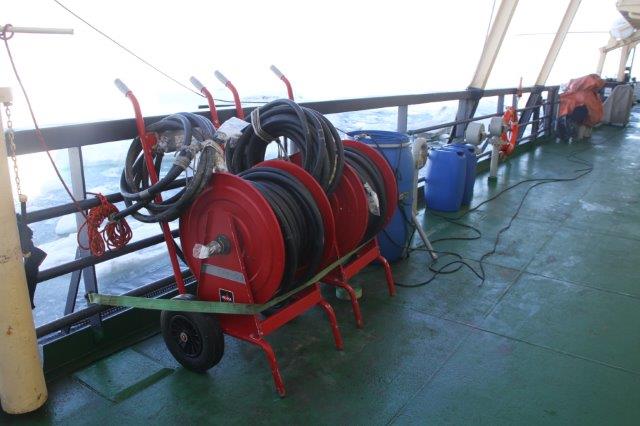 Rolled up fire hoses.